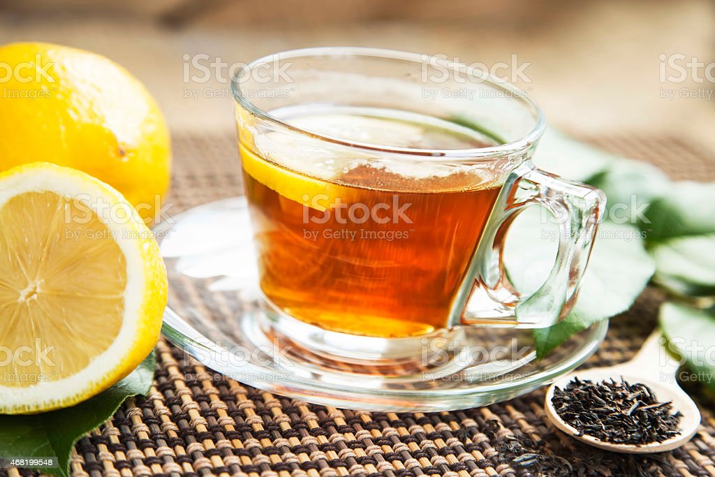Lemon and Green Tea in Transparent Cup, Fresh Healthy Detox Tea